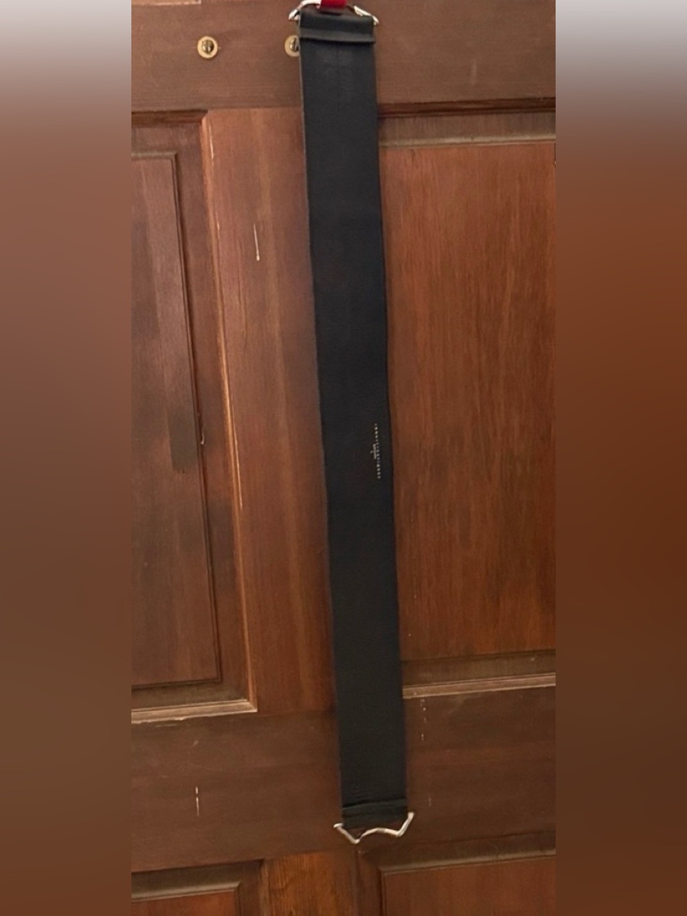 Wide Black Elastic Belt with Silver Buckle, Looks Like Leather.